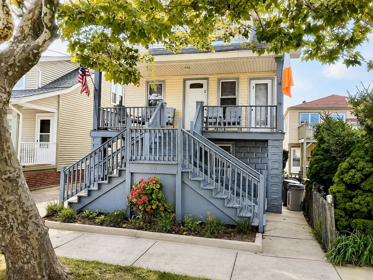The yellow house and blue front porch at 110 East 23rd Avenue in North Wildwood