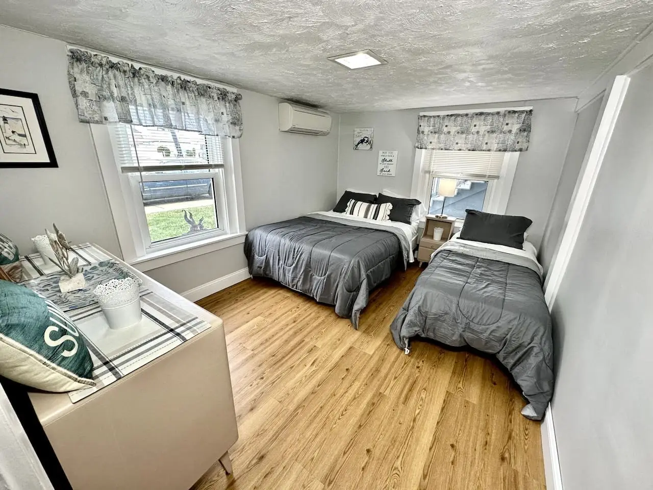 Bedroom with two beds, first floor at 110 East 23rd Avenue